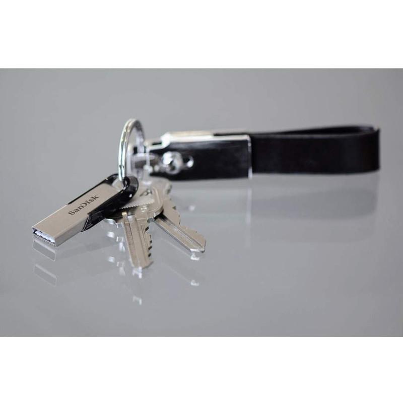 فلش مموری سن دیسک Ultra Flair CZ73 ظرفیت 64 گیگابایت با رابط USB 3.0 و بدنه فلزی مقاوم، سرعت انتقال 150 مگابایت بر ثانیه و سازگار با انواع سیستم‌عامل‌ها و دستگاه‌ها