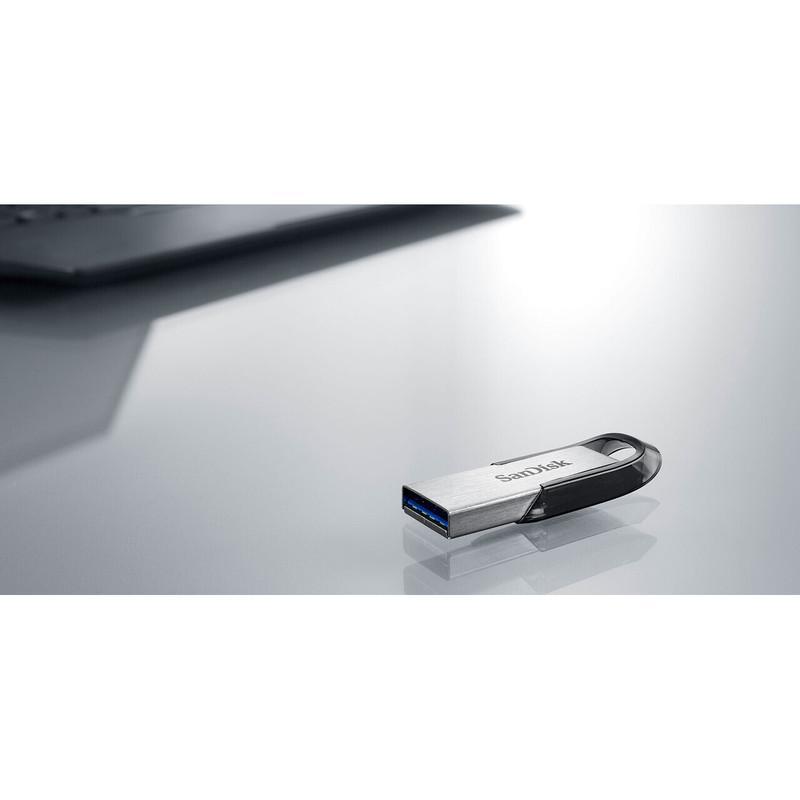 فلش مموری سن دیسک Ultra Flair CZ73 ظرفیت 64 گیگابایت با رابط USB 3.0 و بدنه فلزی مقاوم، سرعت انتقال 150 مگابایت بر ثانیه و سازگار با انواع سیستم‌عامل‌ها و دستگاه‌ها