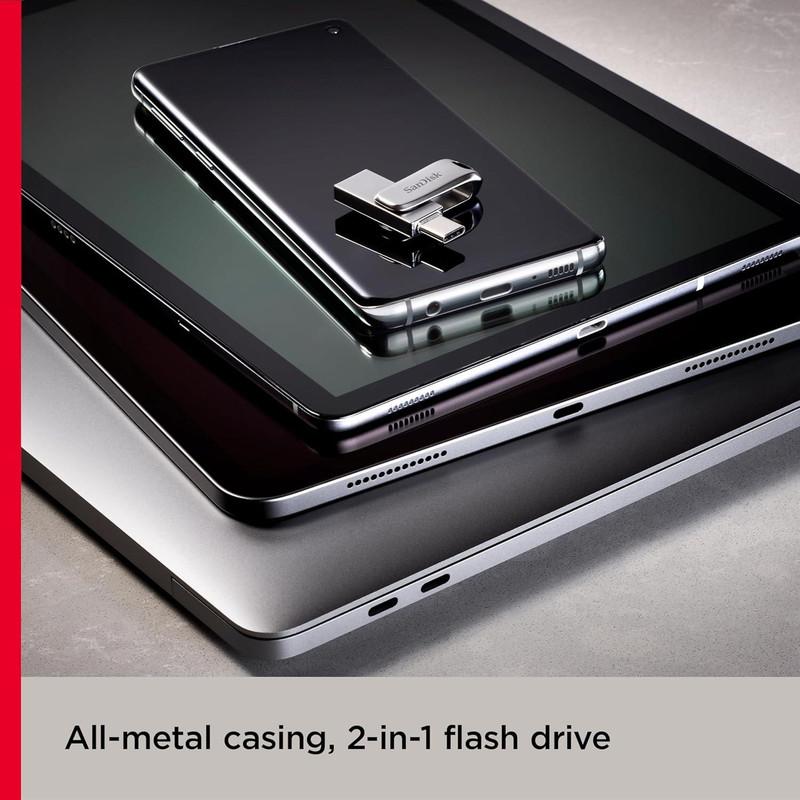 فلش مموری سن دیسک مدل Dual Drive Luxe ظرفیت 128 گیگابایت با طراحی چرخشی، دو رابط USB Type-C و USB Type-A، سرعت انتقال 150 مگابایت بر ثانیه، بدنه فلزی و سازگار با موبایل، تبلت، کامپیوتر و تلویزیون